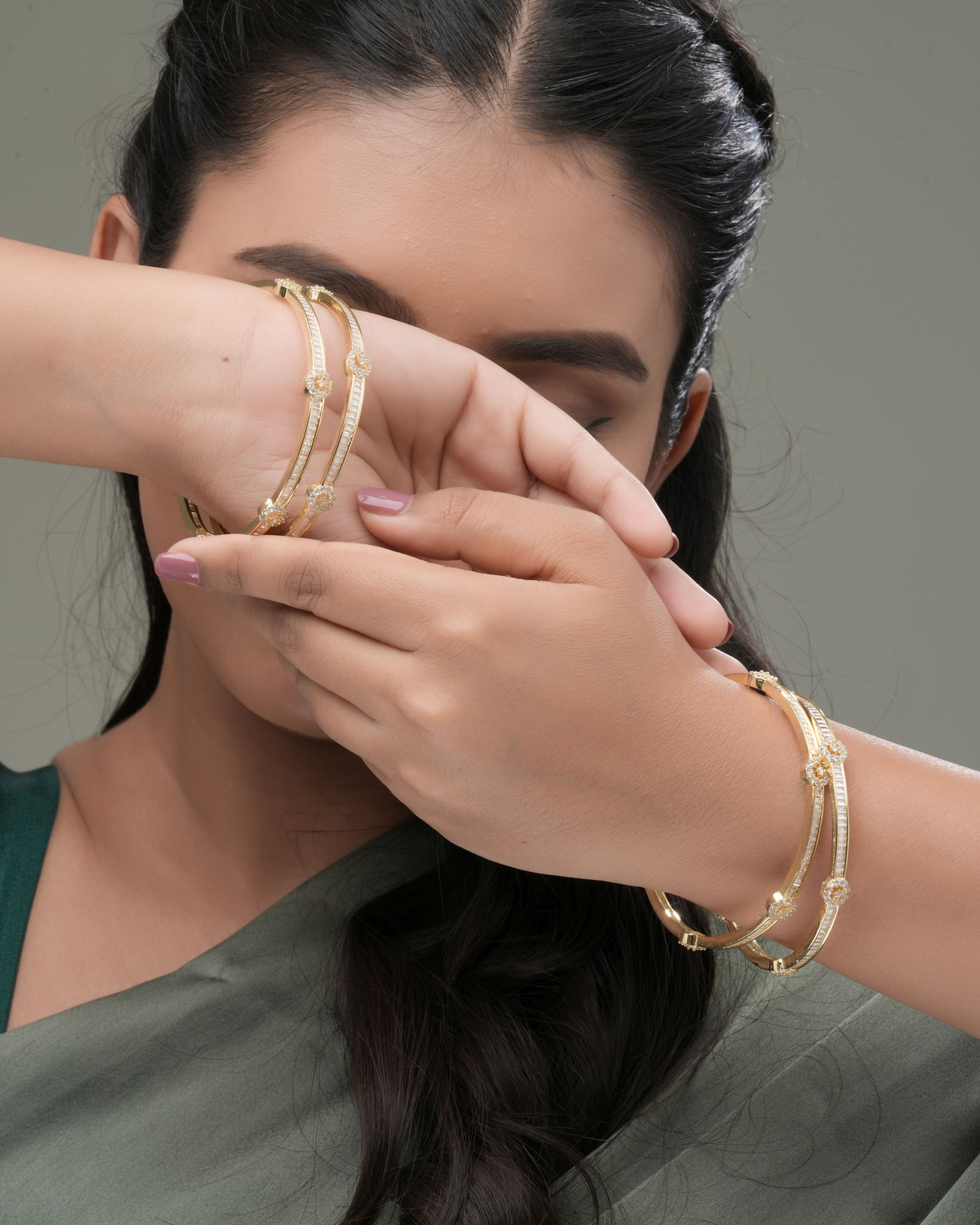 Radiant Gleam – Gold-Finished AD Bangles (Set of 4)