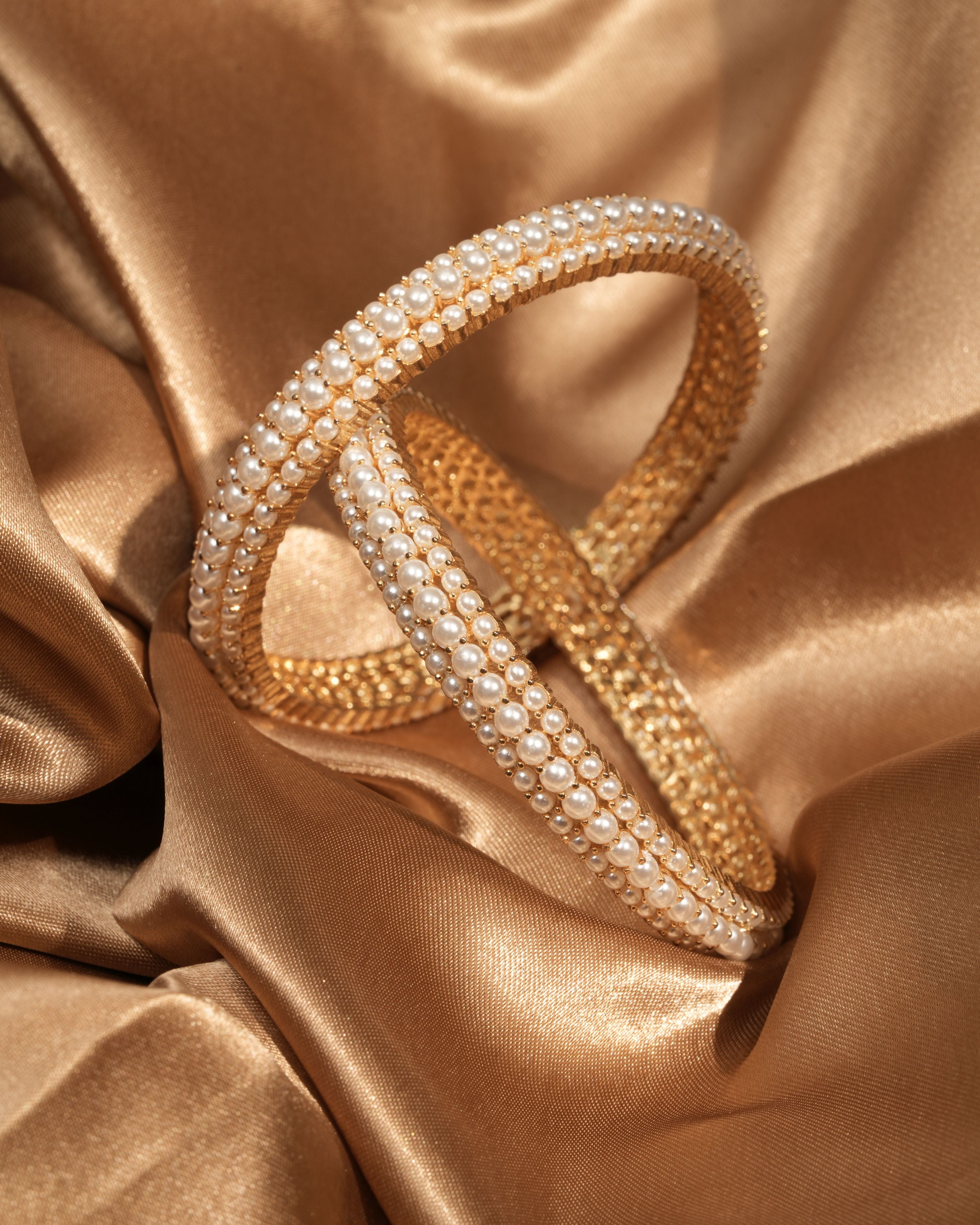 Regal Grace – Gold-Finished Pearl Bangles