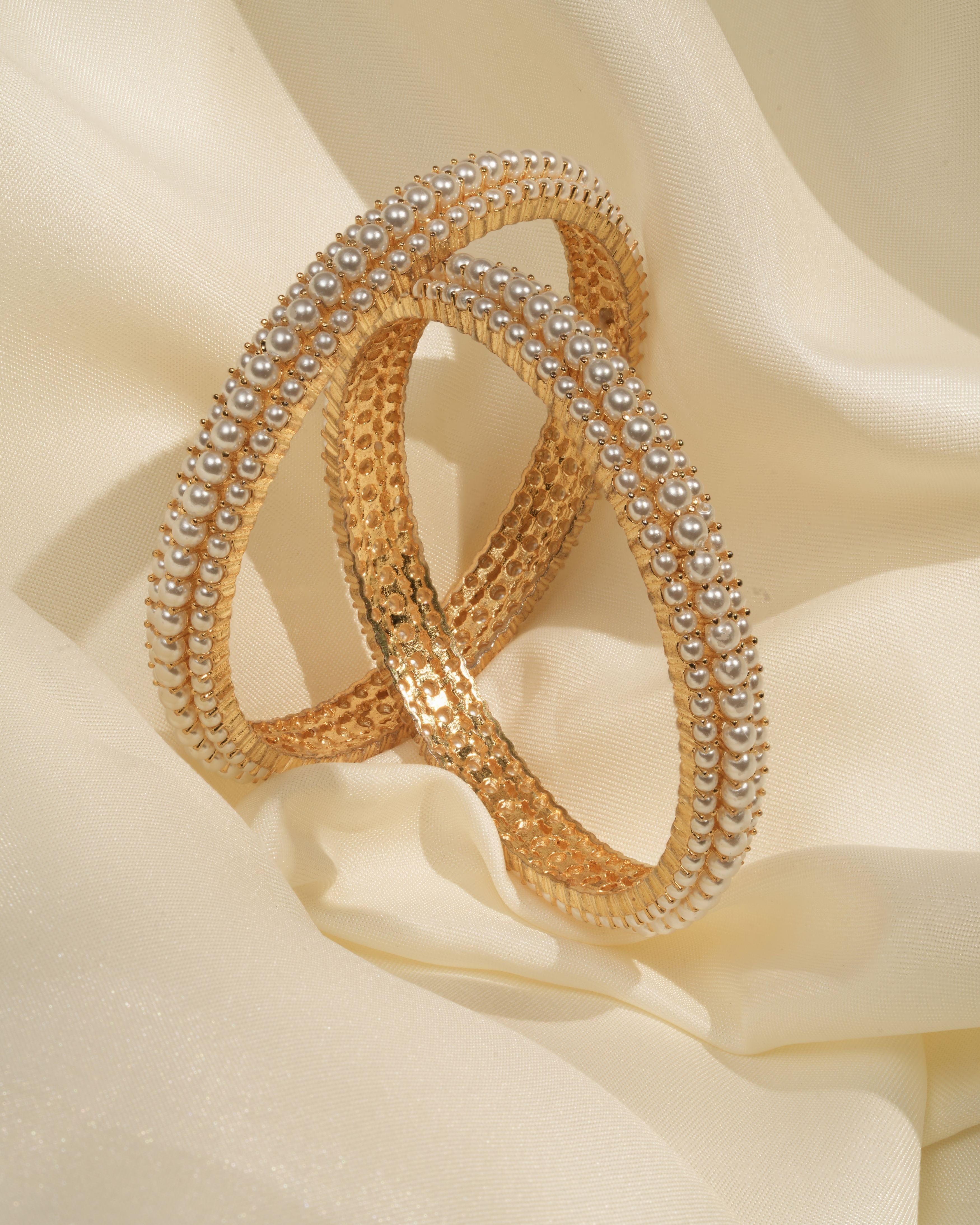 Regal Grace – Gold-Finished Pearl Bangles