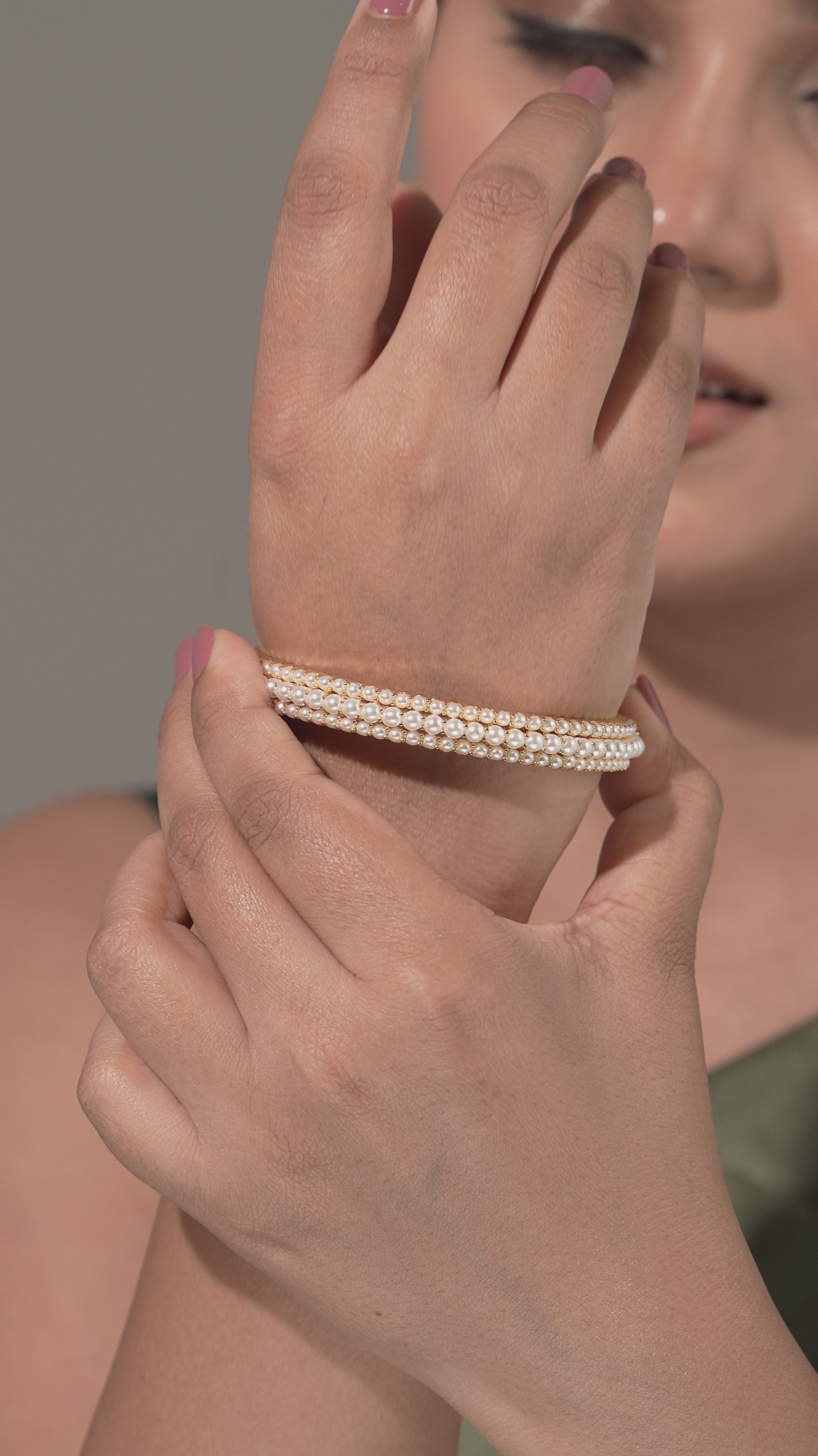 Regal Grace – Gold-Finished Pearl Bangles